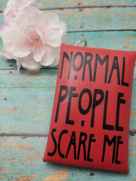 Normal people keychain pouch