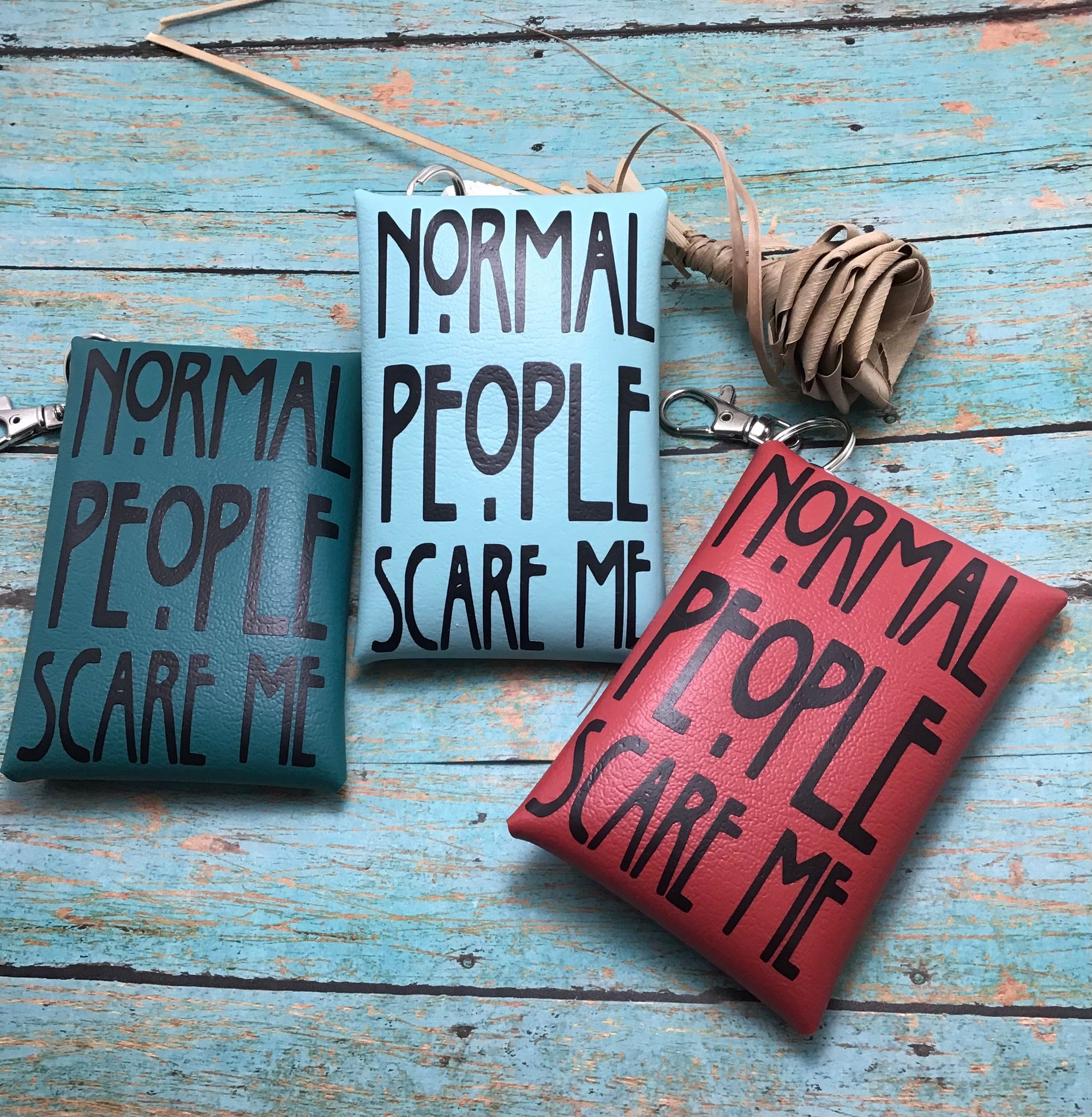 Normal people keychain pouch